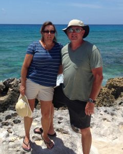 Angie Warner and husband on the beach