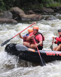 Angie Warner and husband white-water rafting