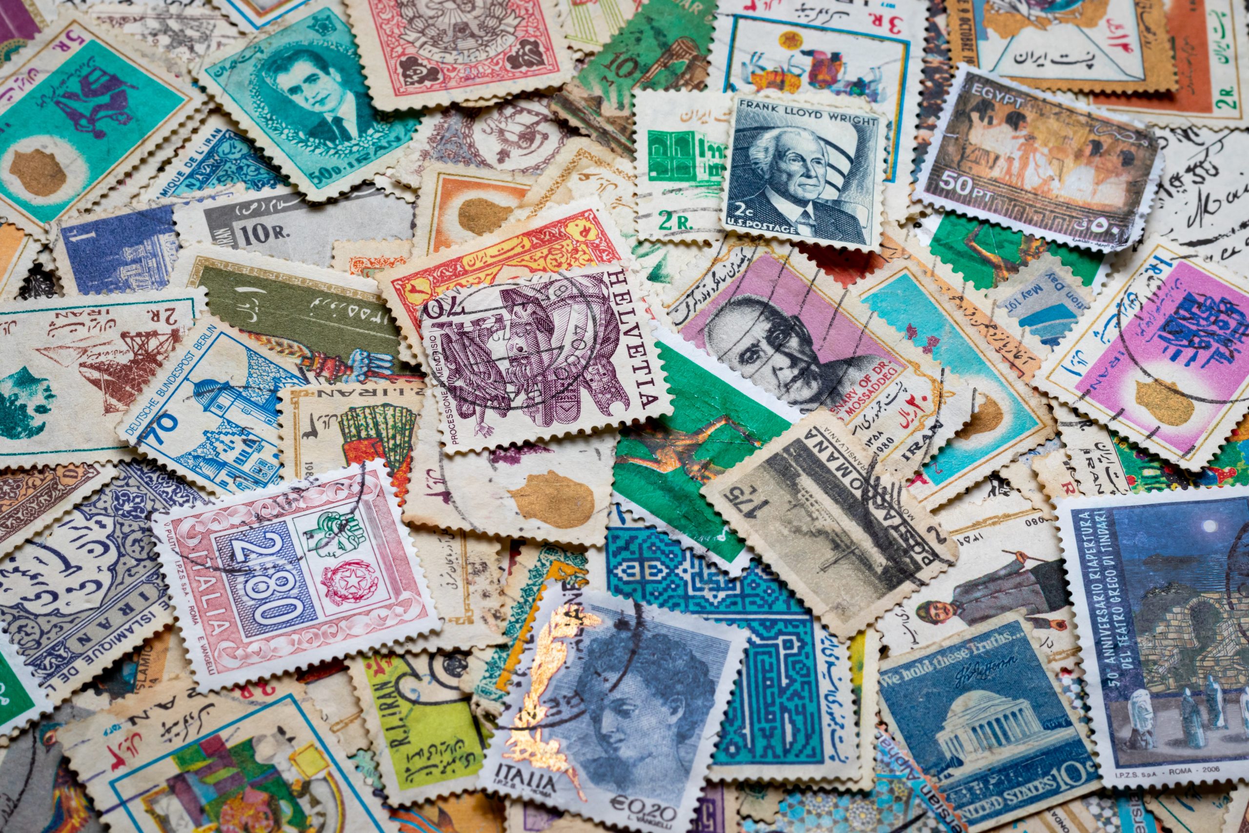 A collage of multi-colored stamps.