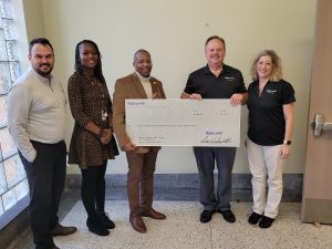 Saint Joseph’s donation to Benton Harbor Area Schools. Included in the photo are: Paul Korson, Tiana Batiste-Waddell, Dr. Kelvin Butts, Phil Archer and Kim Thumm.