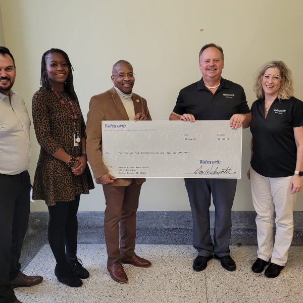 Saint Joseph’s donation to Benton Harbor Area Schools. Included in the photo are: Paul Korson, Tiana Batiste-Waddell, Dr. Kelvin Butts, Phil Archer and Kim Thumm.
