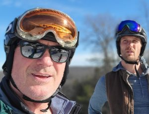 David Grisa snowboarding with friend
