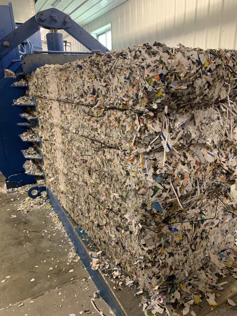 A bale of shredded, recycled paper