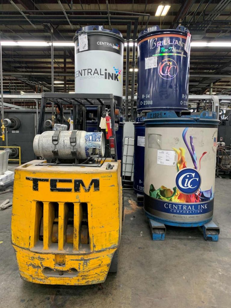 Three barrels of ink in a Walsworth printing facility