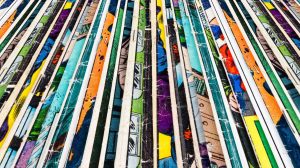 A stack of colorful comic books