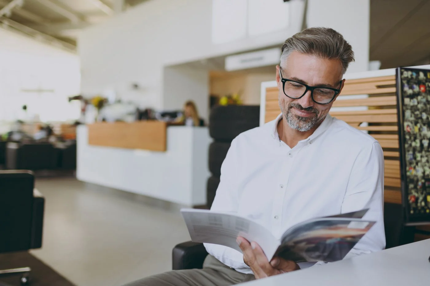 A business man reading a catalog