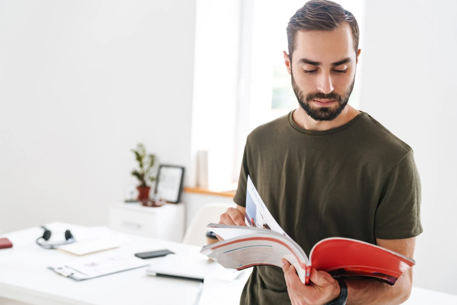 Man reading a catalog