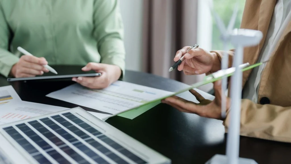 Business workers creating eco friendly plans