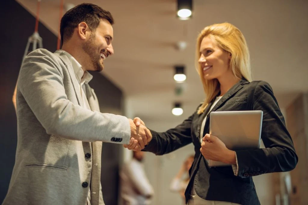 Business partners shaking hands