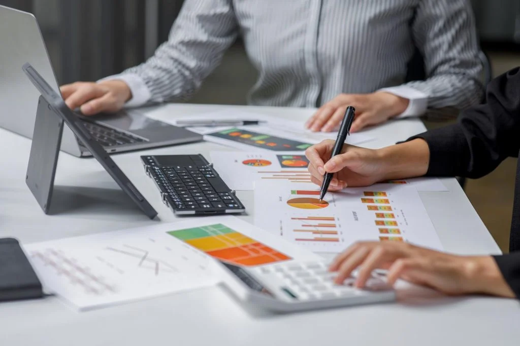Professionals working at a desk